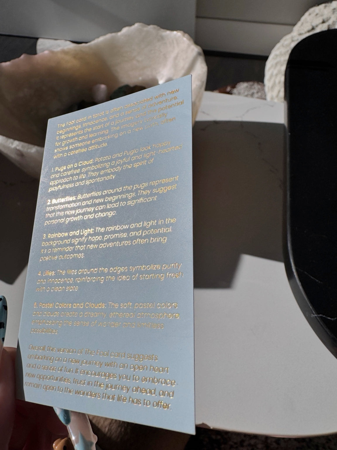 Back of the Posoulo Fool card with its symbolic meaning and interpretation